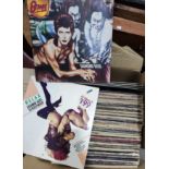 A collection of vintage LPs including David Bowie, Diamond Dogs etc