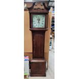 An oak cased 30 hour longcase clock with square painted dial