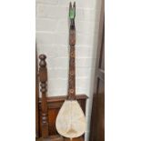 A mid 20th century Gusle - a south eastern European single string instrument made from wood and skin