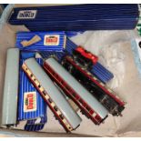 A selection of Hornby Dublo tinplate track, boxed; various accessories
