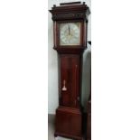 An 18th century figured mahogany longcase clock by Ptr Green, Liverpool, the caddy top hood with