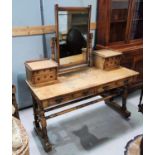 An oak Aesthetic movement mirror back dressing table in the manner of Lamb, with turned 'A' frame