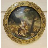 A large 19th century Vienna style circular wall plaque with blue gilt border decorated in polychrome