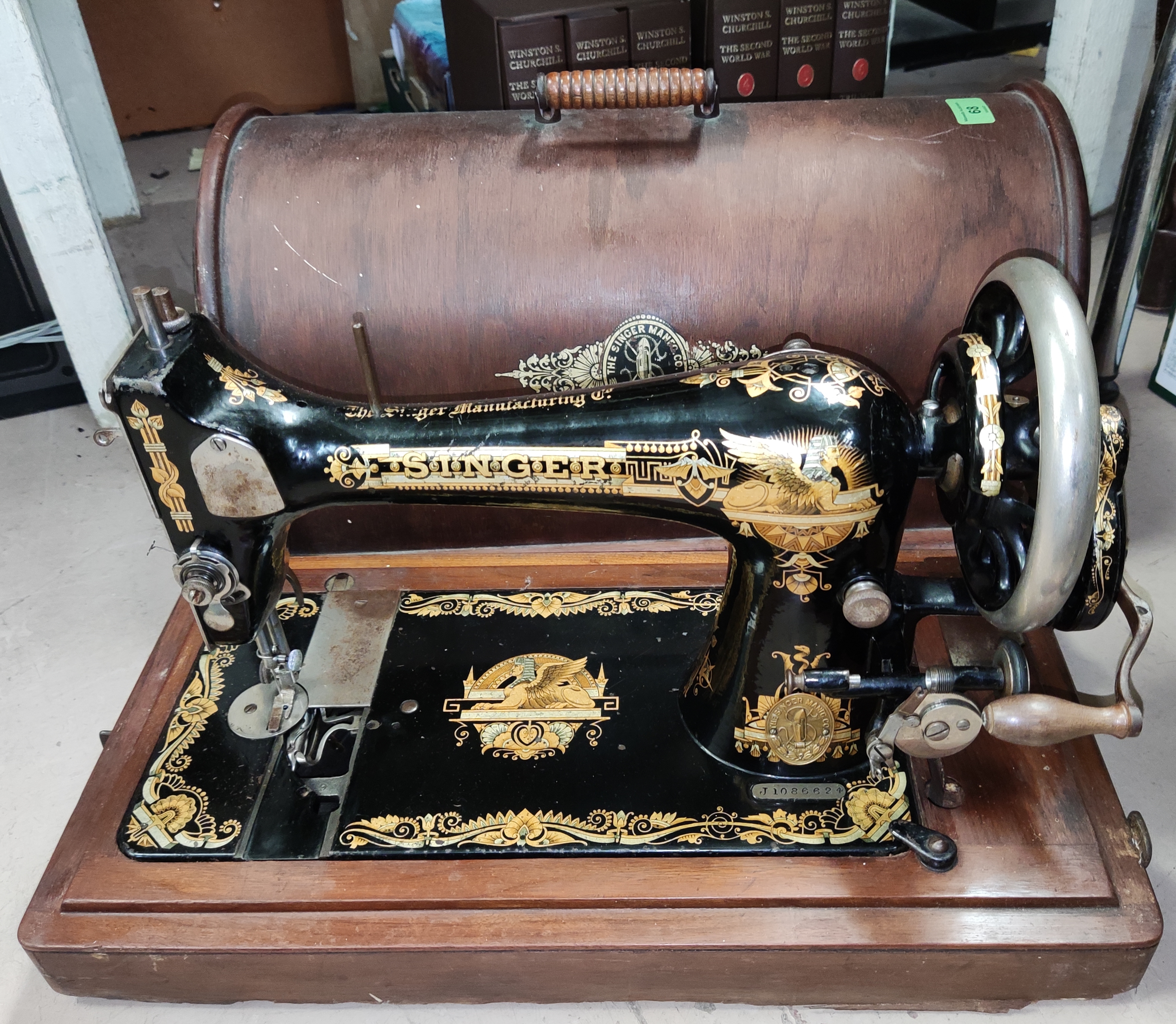 A Singer hand operated sewing machine