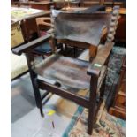 A Cromwellian style captain's armchair with leather studded later seat and back  (some leather a.f.)