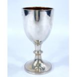 An egg cup on collared pedestal base, with beaded decoration, Chester 1926, 1.6 oz