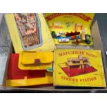 Matchbox Service Station (a.f some pieces missing) and Road layout, 7 unboxed Matchbox cars