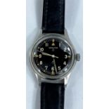 A Military Hamilton Wrist Watch with arrow to the back, numbered GB-9101000, H 1247 M, on a later