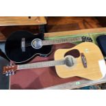 Two steel strung acoustic guitars, Stagg & Burswood, one left handed.