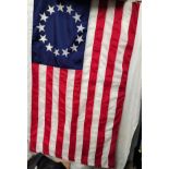 An American reproduction Betsy Ross Flag with eagle finial, 137 x 84cm