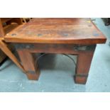 A heavy rustic square top coffee table; a fluted stained mahogany torchere