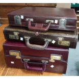 A leather writing case inscribed Stephen Harlow 1952, 3 attaché cases