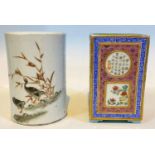 A Chinese ceramic square brush pot with panel decoration, Chinese writing and various flowers,