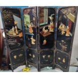 A Chinese four fold lacquer screen with coloured soap stone characters in relief Length 46cm