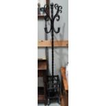 A cast iron coat stand