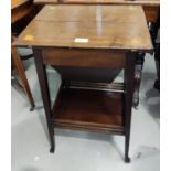 An inlaid mahogany sewing box table with shelf below
