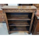 A Victorian carved oak 3 height bookcase