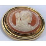 A shell cameo brooch/pendant in yellow metal surround stamped '585' 6.2gms gross