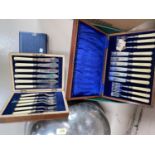 Two oak cased sets of 6 fish knives and forks and 2 boxed sets of tea knives