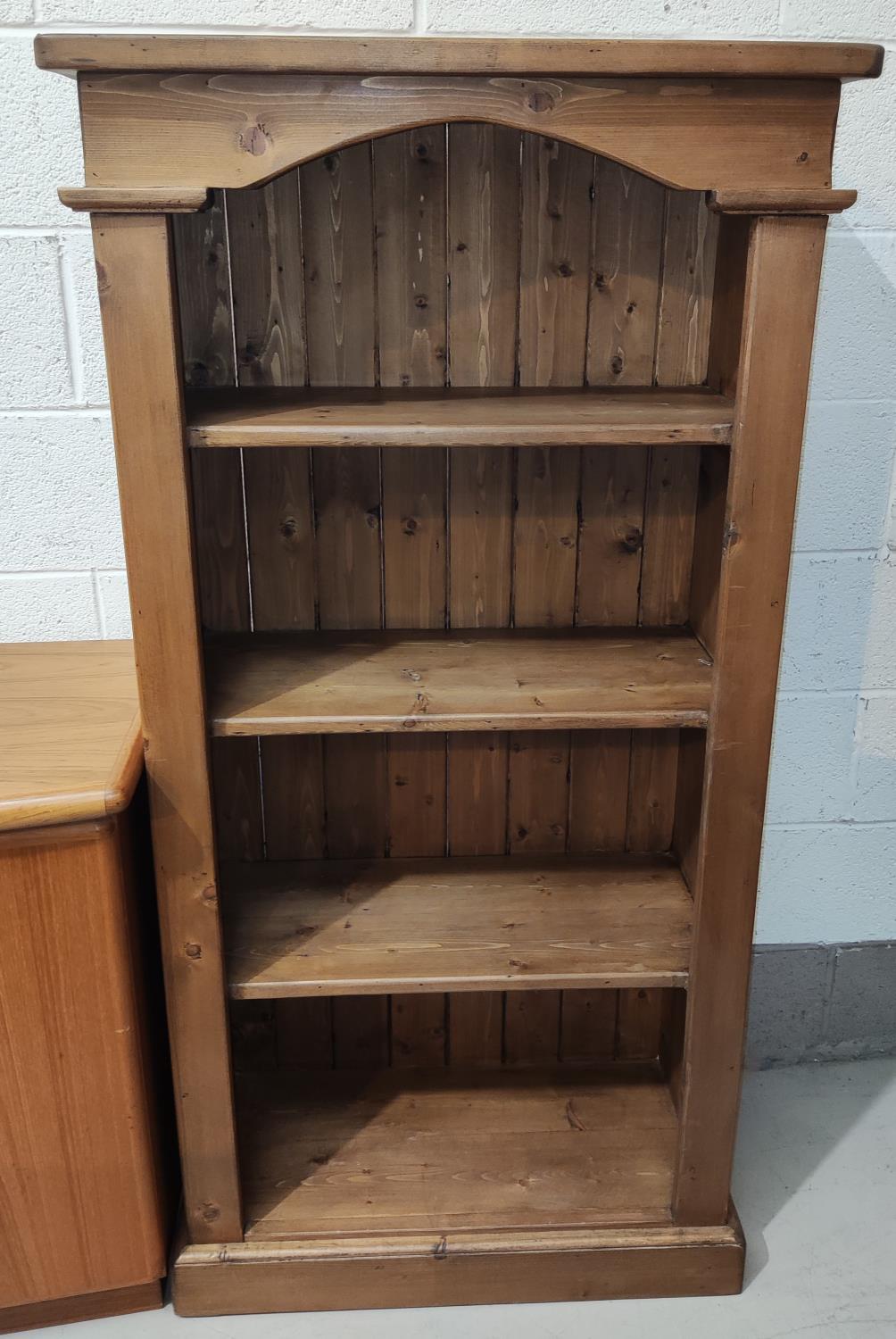 A pine 4 height bookcase