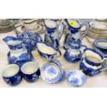 A pair of blue and white jugs commemorating the 1851 Great Exhibition (some chips and cracks) and