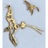 An 18ct hallmarked pendant of a bird with long rail in flight, 2.84 gm; another small bird pendant