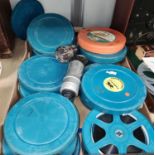A selection of Vintage Film Reels, including dog and horse races; two Bell & Howell lenses etc.