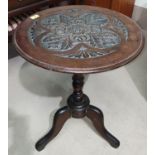 A 19th century carved oak occasional table with circular top on pedestal base