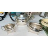 A hallmarked silver 3 piece tea set of rounded rectangular form, Sheffield 1920, 38 oz