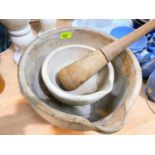 A very large pestle & mortar, diameter 35cm, stick length 34cm