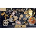 A vintage cashbox and a selection of costume jewellery including 2 hallmarked silver medallions
