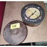 A compass in circular wooden case, from a Chinese junk