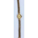 A lady's 9ct hallmarked gold Geneva watch and bracelet strap (face a.f), 13.3gm gross