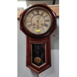 An American walnut cased drop dial striking wall clock