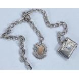 A hallmarked silver Albert chain with enamelled medallion and hallmarked silver vesta case attached,