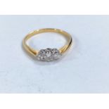 A lady's dress ring set with 3 diamonds in yellow metal shank, 18k, size M 1.77gm size