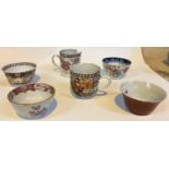 A small set of Chinese cups and tea bowls, various decoration with some areas of restoration or