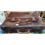 A 1920's shell hide leather suitcase by Finnegan's of Manchester etc