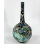 A Chinese bottle vase decorated with green & yellow birds, double circle mark to base, height 28cm.