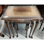 A mahogany nest of 3 occasional tables and a reproduction mahogany occasional table on reeded legs