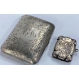 A chased and monogrammed hallmarked silver cigarette case, Birmingham 1906 and a hallmarked silver