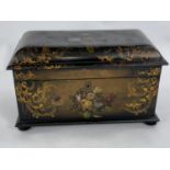 A mid Victorian painted black lacquer 2 division tea caddy with shell inlay and original cut glass