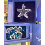 A Swarovski Starfish 2005 renewal gift in original box 679350 and a set of shell mini set originally