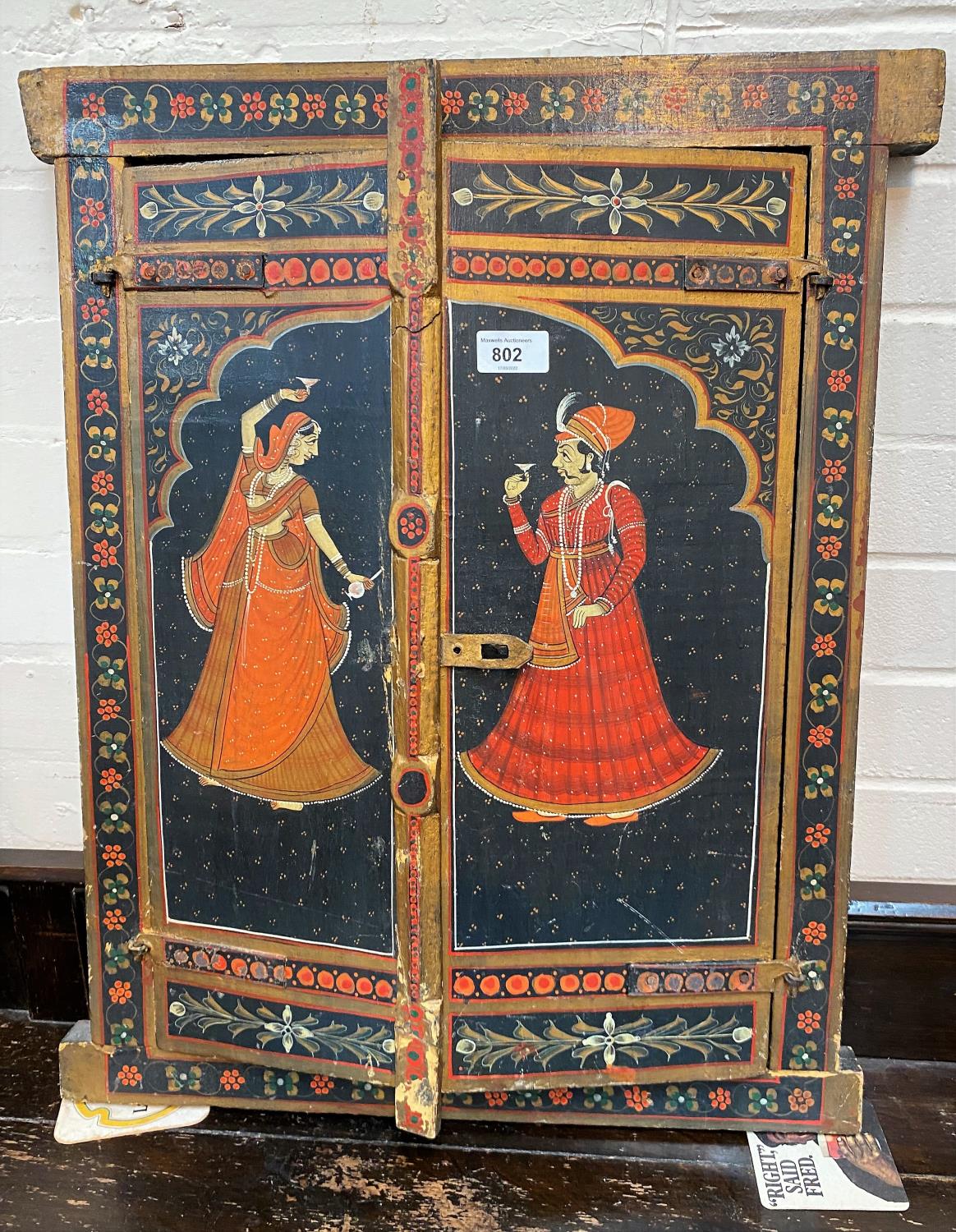 Indo Persian wooden window shutters painted with dancing male and female figures, 62 x 50 cm