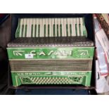 A 48 base piano accordion by Casali, Verona, in leather case (case a.f.)