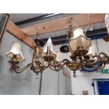 A pair of classical style gilt metal 5 branch centre lights and 2 x 2 branch acanthus wall lights