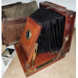 A 19th century 'Amber' mahogany and brass plate camera by Thornton Pickard