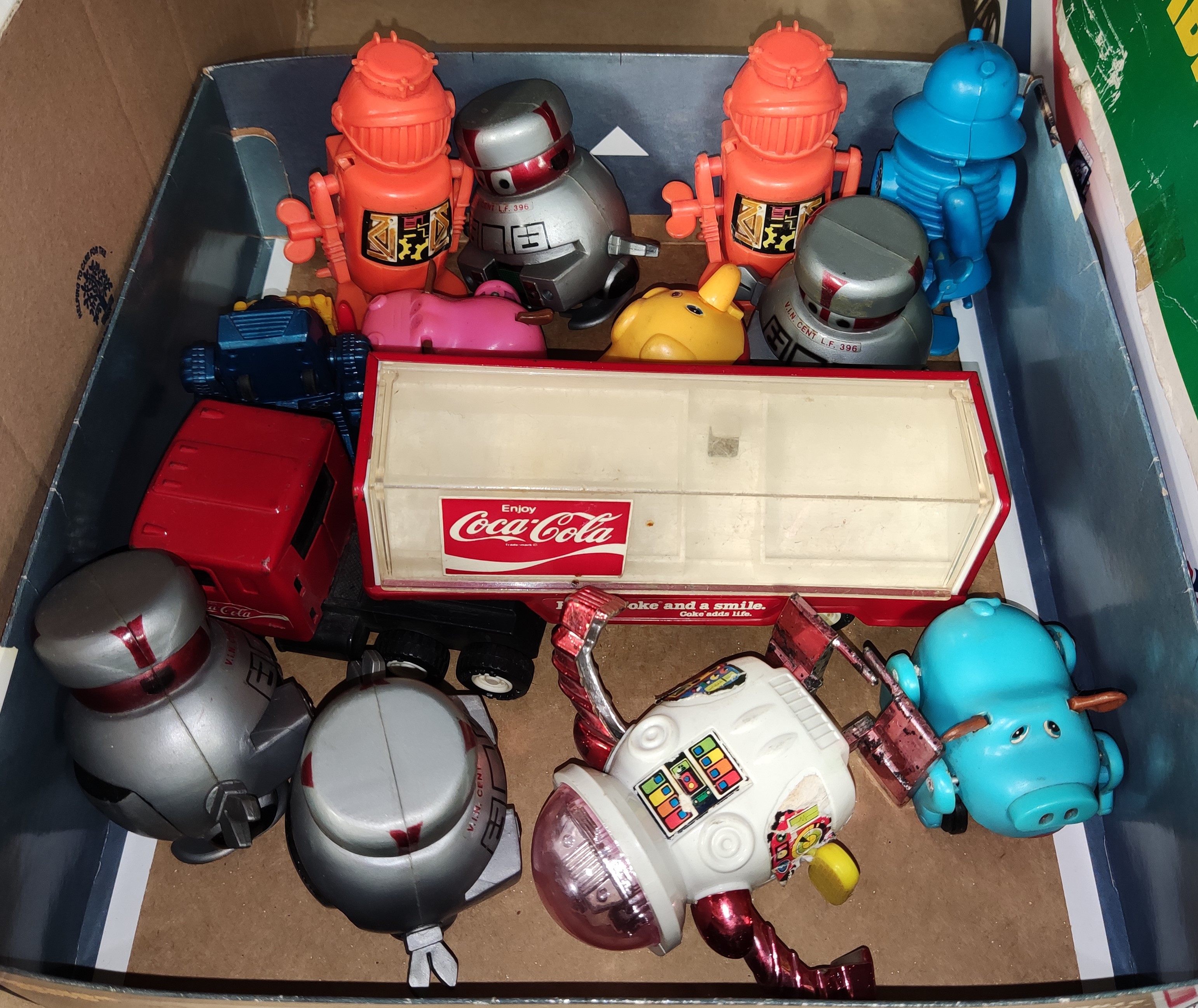 A vintage Japanese Buddy Coca-Cola truck; a selection of windup toys:  V.I.N.Cent LF 396; etc.