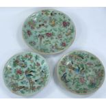 A large and 2 small celadon ground Chinese famille vert plates, diameter 24 and 19cms