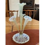 A 19th century Vaseline glass table centre with 4 flutes
